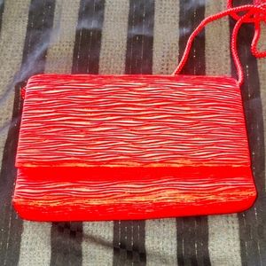 La Regale Red satin like purse
